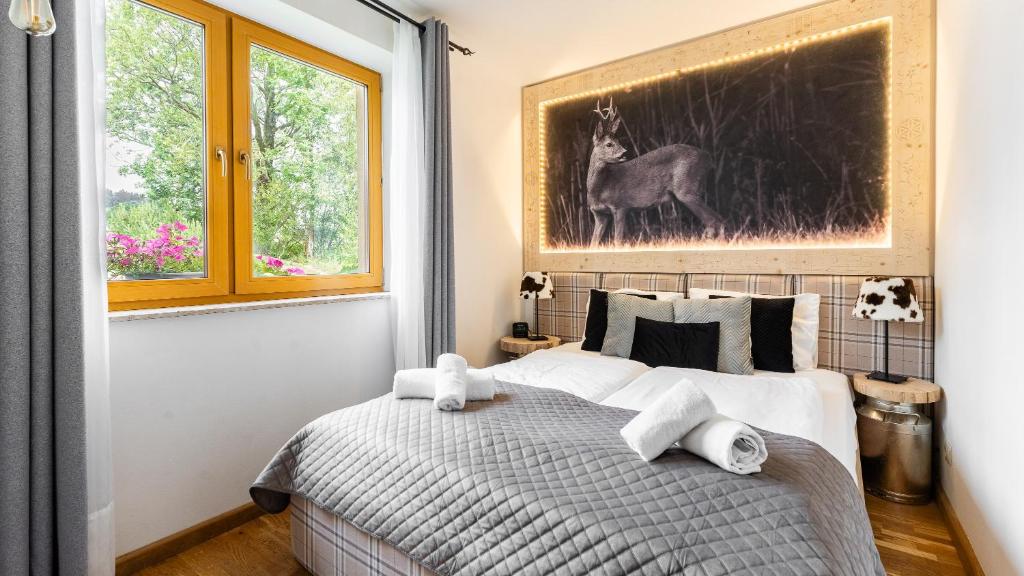 Posteľ alebo postele v izbe v ubytovaní Aparthotel Delta Białka