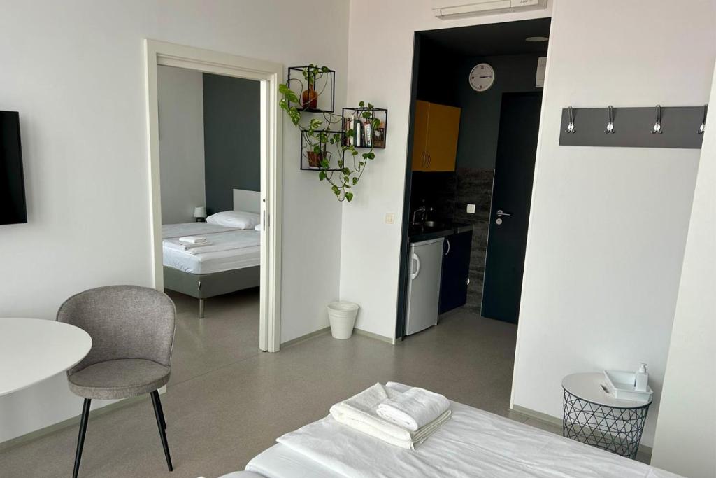 Postel nebo postele na pokoji v ubytování Hostel Villa Domus