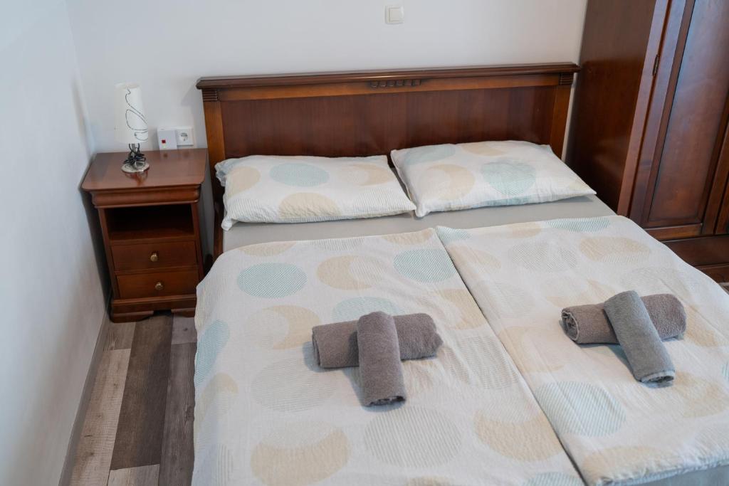 Postel nebo postele na pokoji v ubytování Pension Kolibri