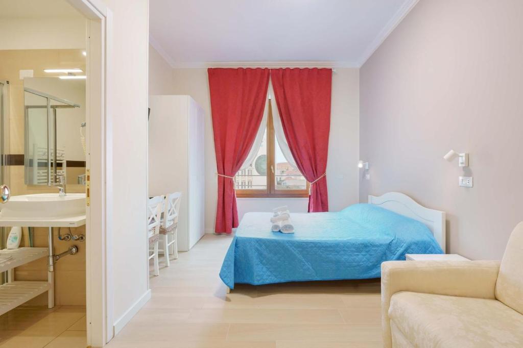 Postel nebo postele na pokoji v ubytování Affittacamere 5 Stelle