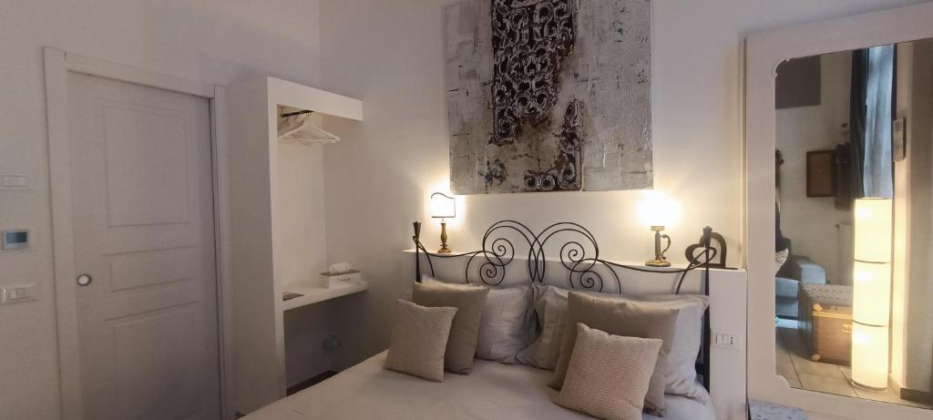 Una cama o camas en una habitación de Carducci
