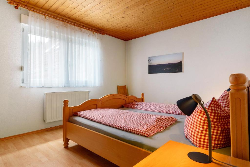 Postel nebo postele na pokoji v ubytování Grüner Ausblick