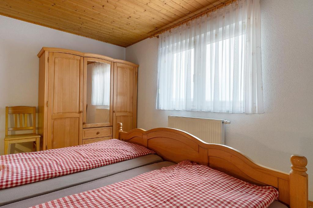 Postel nebo postele na pokoji v ubytování Grüner Ausblick