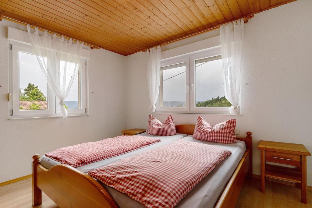 Postel nebo postele na pokoji v ubytování Grüner Ausblick