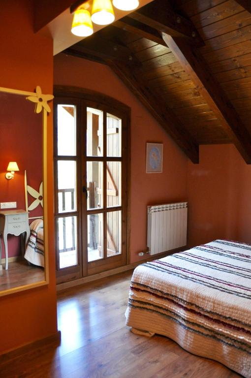 Postel nebo postele na pokoji v ubytování Casa Montse