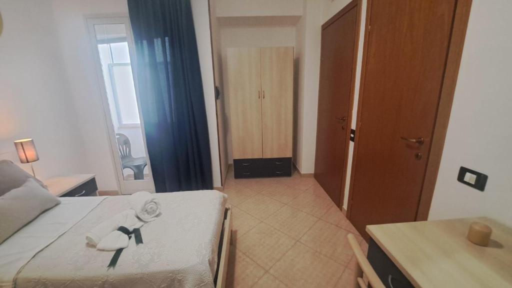 Postel nebo postele na pokoji v ubytování MariMare B&B