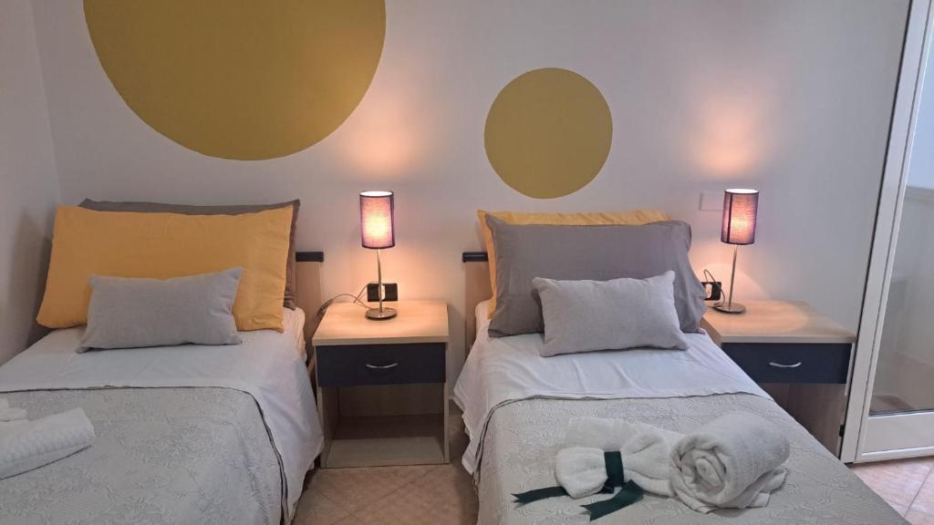 Postel nebo postele na pokoji v ubytování MariMare B&B