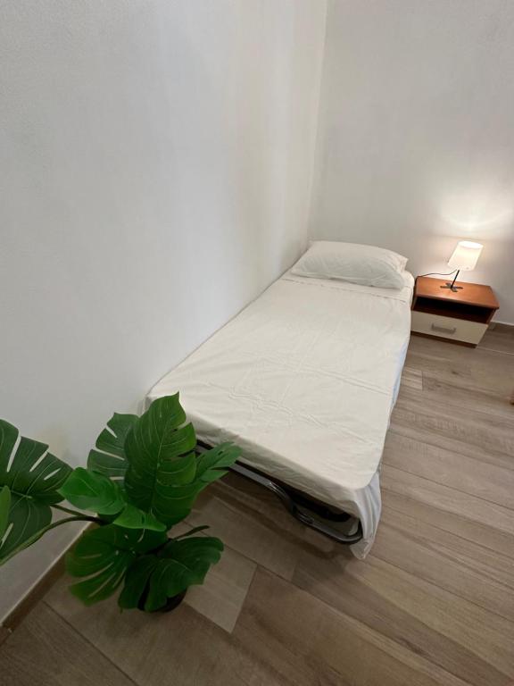 Letto o letti in una camera di Borgo nel Vigneto