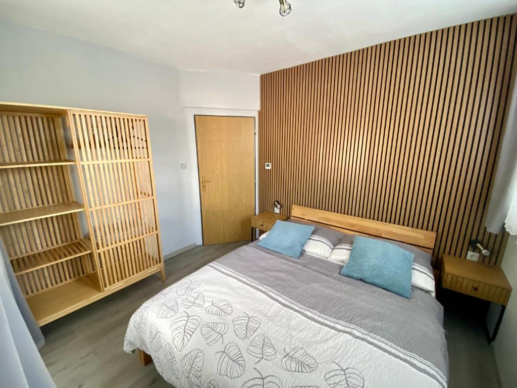Postel nebo postele na pokoji v ubytování Apartmány na Horce
