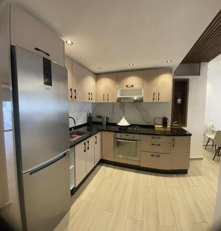 Kuchyň nebo kuchyňský kout v ubytování Appartement vue sur Tower Hassan