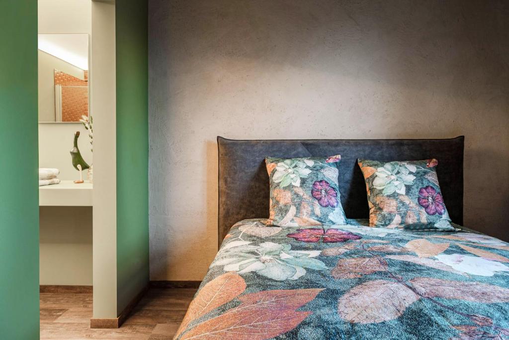 Letto o letti in una camera di B&B CONVENT Begijnhof Herentals