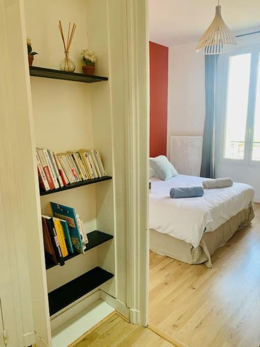 Un ou plusieurs lits dans un hébergement de l'établissement Maison de ville au Cœur d'Angoulême- 2 chambres-Wifi- Cosy - Idéal de 1 à 6 Personnes - conciergerie J&N