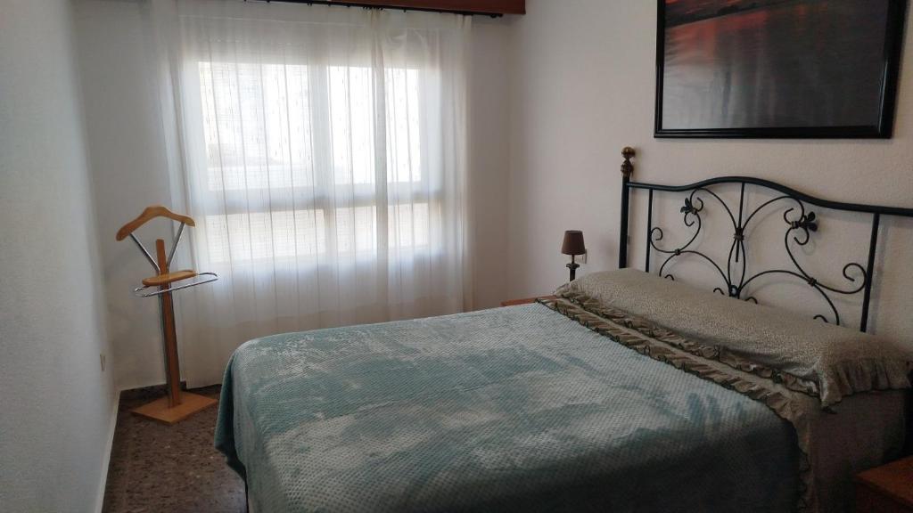 Postel nebo postele na pokoji v ubytování Apartamento Jardin II