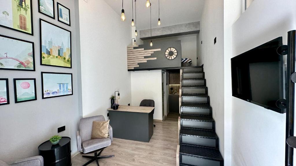 TV a/nebo společenská místnost v ubytování Cosy Studio Loft