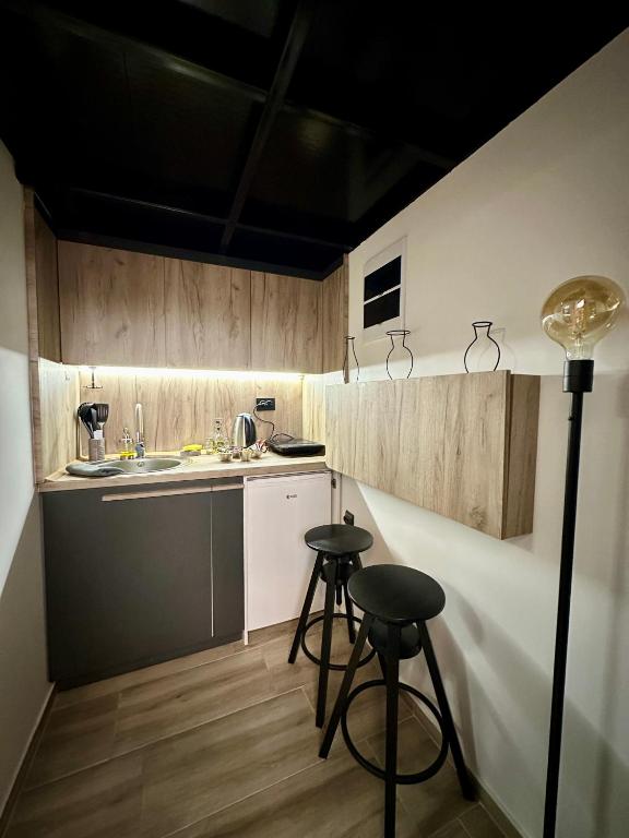 Kuchyň nebo kuchyňský kout v ubytování Cosy Studio Loft