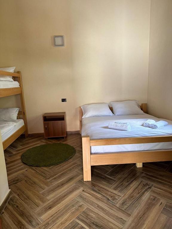 Postel nebo postele na pokoji v ubytování Valbona Relax