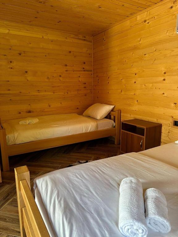 Postel nebo postele na pokoji v ubytování Valbona Relax