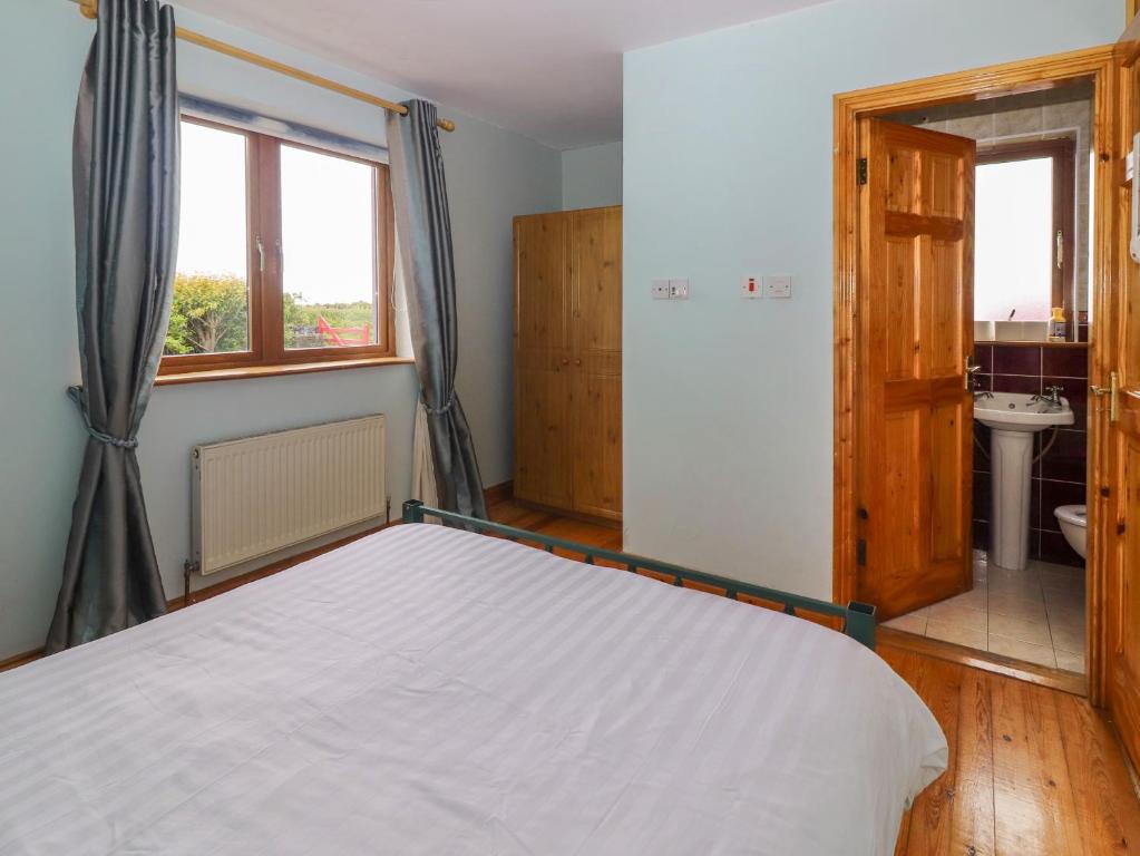 Postel nebo postele na pokoji v ubytování Levally House