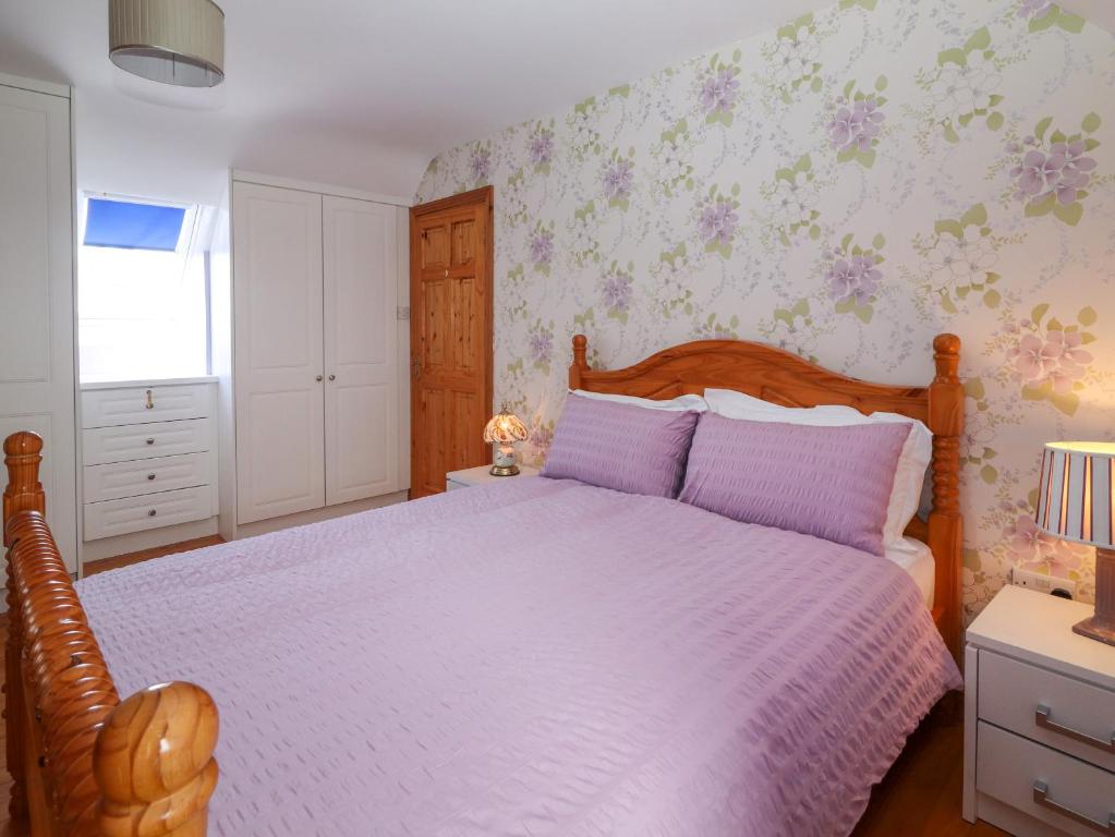Postel nebo postele na pokoji v ubytování Levally House