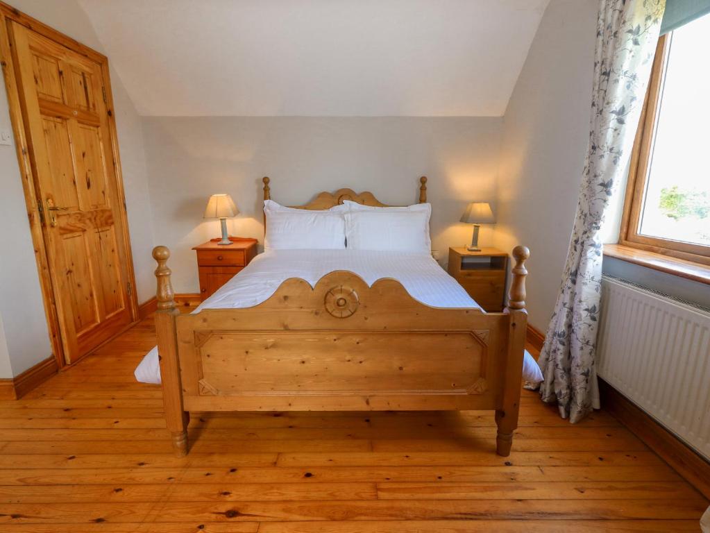 Postel nebo postele na pokoji v ubytování Levally House