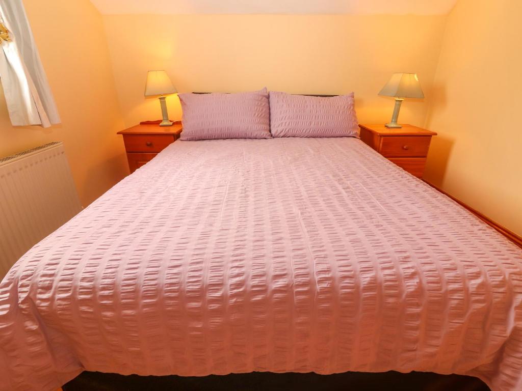 Postel nebo postele na pokoji v ubytování Levally House