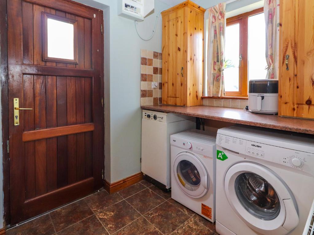 Kuchyň nebo kuchyňský kout v ubytování Levally House