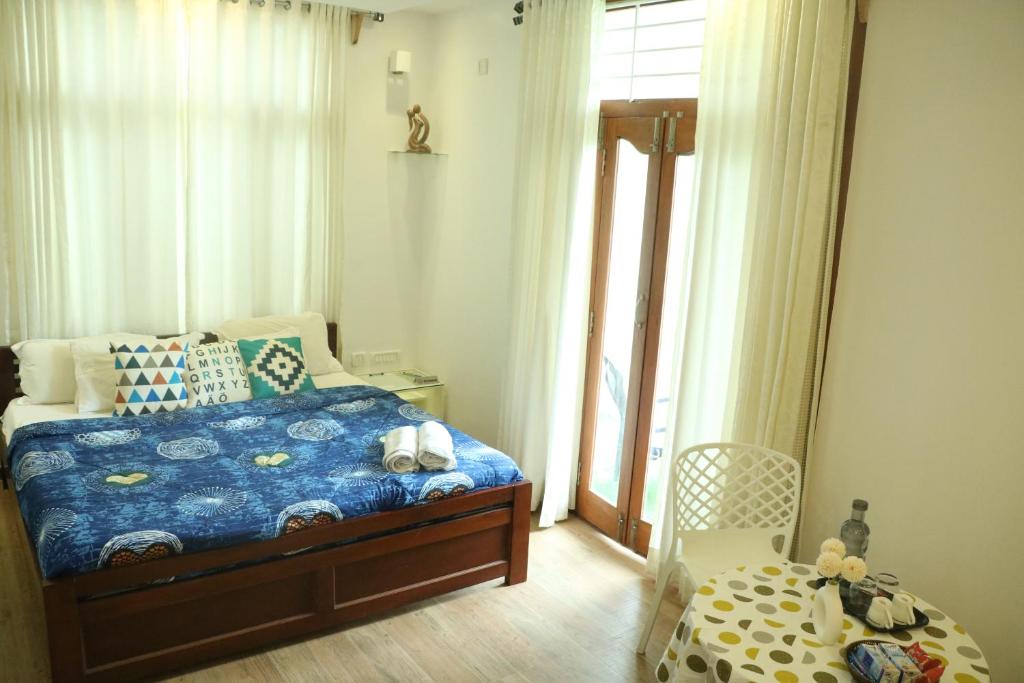 Postel nebo postele na pokoji v ubytování SRI VARİ studio Apartments