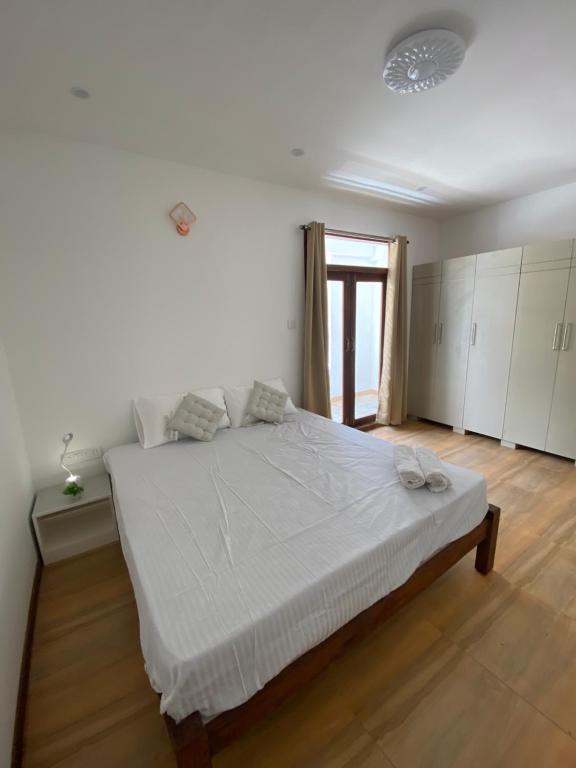 Postel nebo postele na pokoji v ubytování SRI VARİ studio Apartments