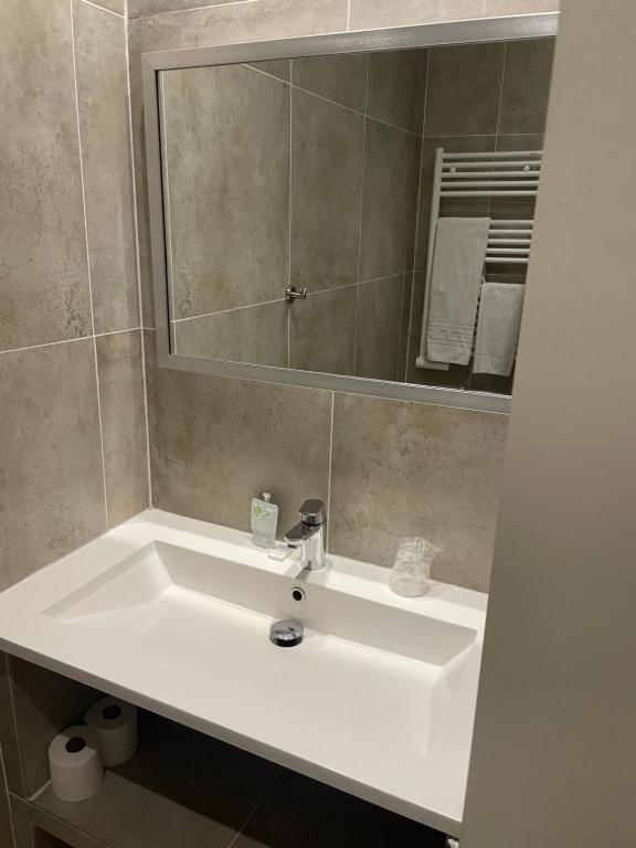 Koupelna v ubytování Hotel Azur