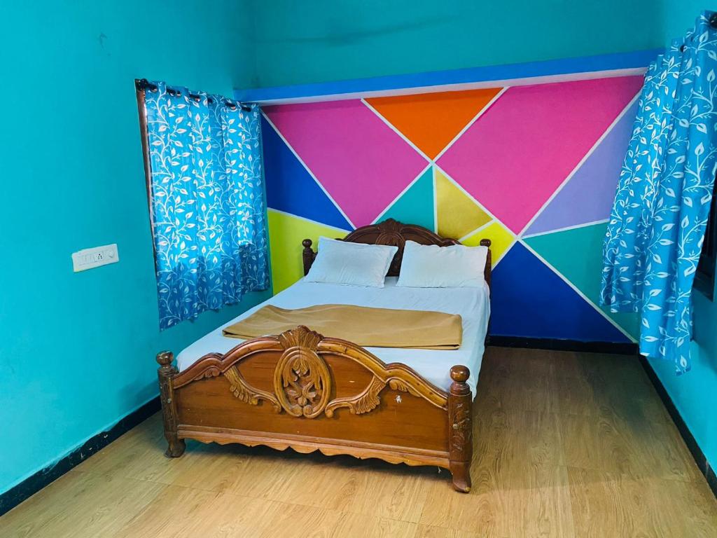 Postel nebo postele na pokoji v ubytování Bamboo Holiday Resort & Homestay Yercaud