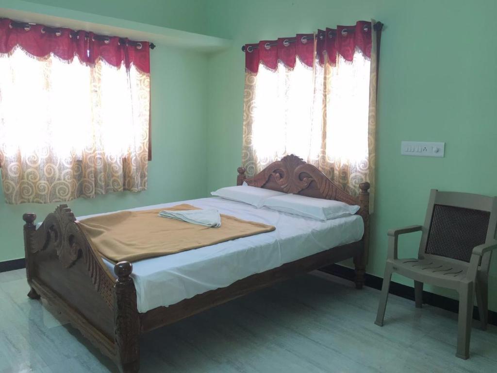 Postel nebo postele na pokoji v ubytování Bamboo Holiday Resort & Homestay Yercaud