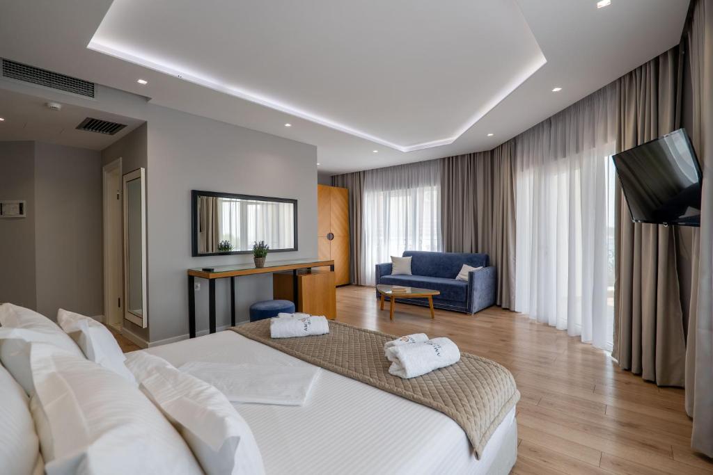 TV a/nebo společenská místnost v ubytování AMI MAR Hotel