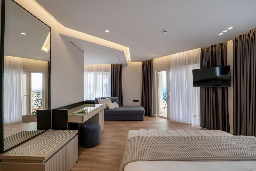 Postel nebo postele na pokoji v ubytování AMI MAR Hotel