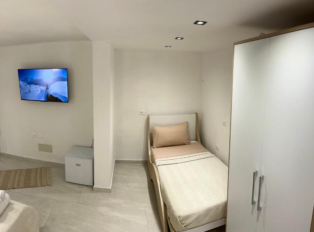Postel nebo postele na pokoji v ubytování Aloha House
