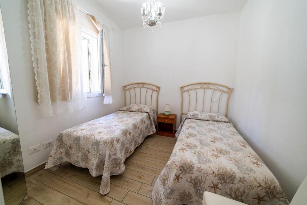 Postel nebo postele na pokoji v ubytování Onda