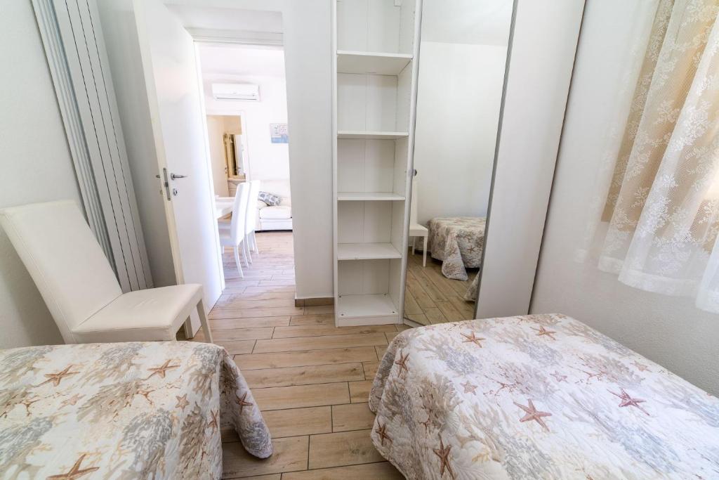 Postel nebo postele na pokoji v ubytování Onda