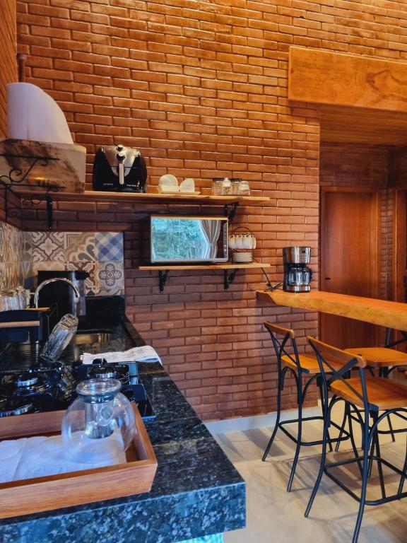 Kuchyň nebo kuchyňský kout v ubytování Casa na Rampa - Hospedagem no Caravaggio