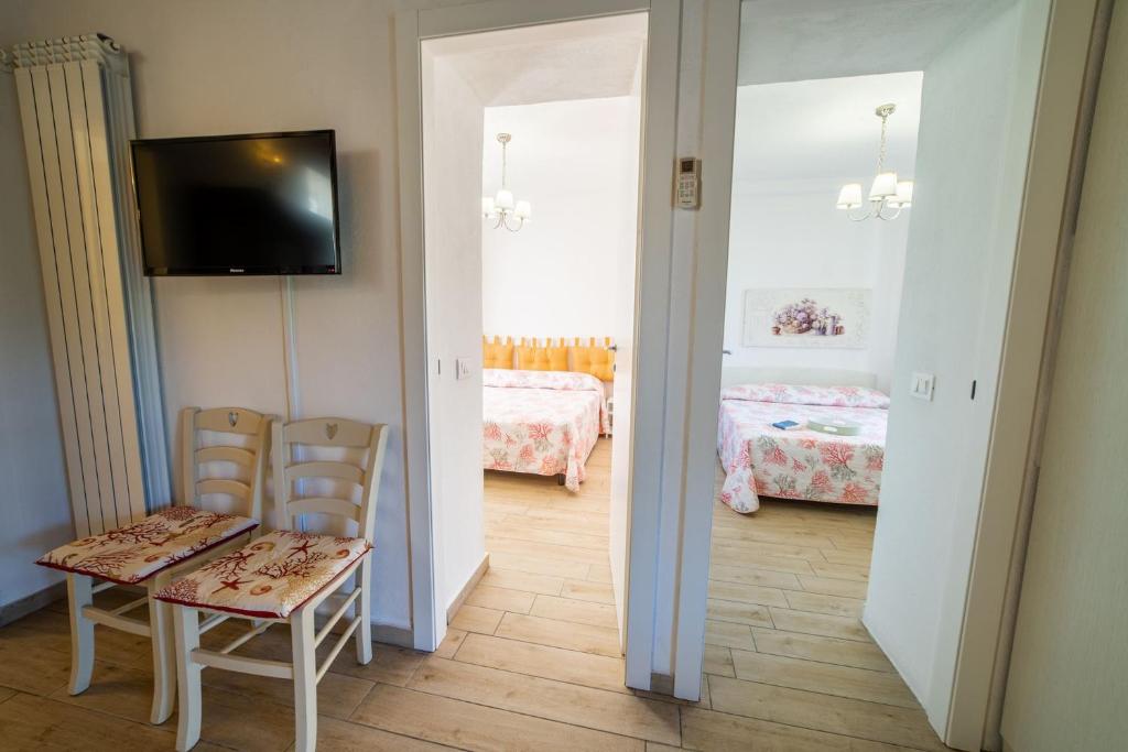 Postel nebo postele na pokoji v ubytování Marina