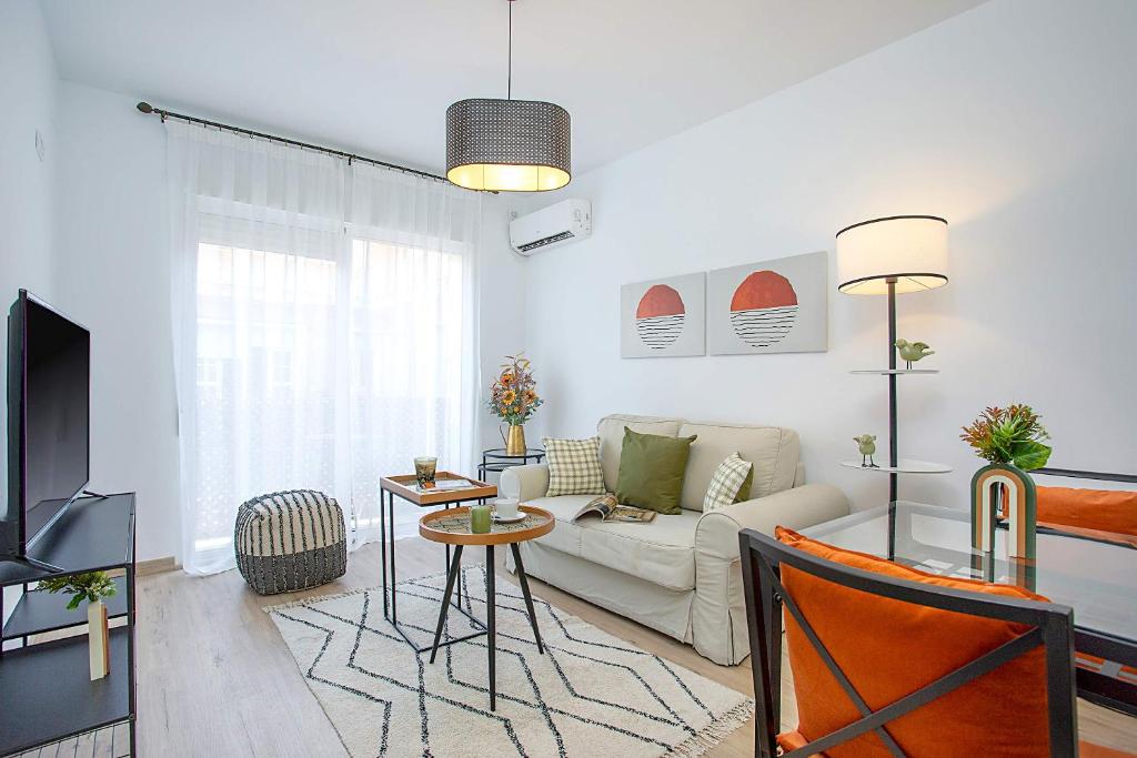 Televízia a/alebo spoločenská miestnosť v ubytovaní Genteel Home Santa Marta