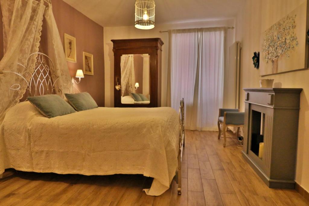 Ένα ή περισσότερα κρεβάτια σε δωμάτιο στο La Casa di Livia