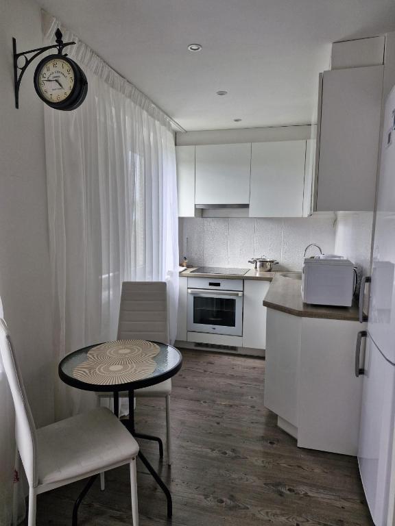 Kuchyň nebo kuchyňský kout v ubytování Tallinna mnt 15 Apartament