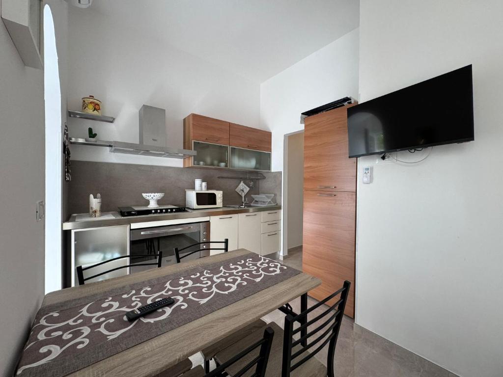 Kuchyň nebo kuchyňský kout v ubytování B&B Primalba