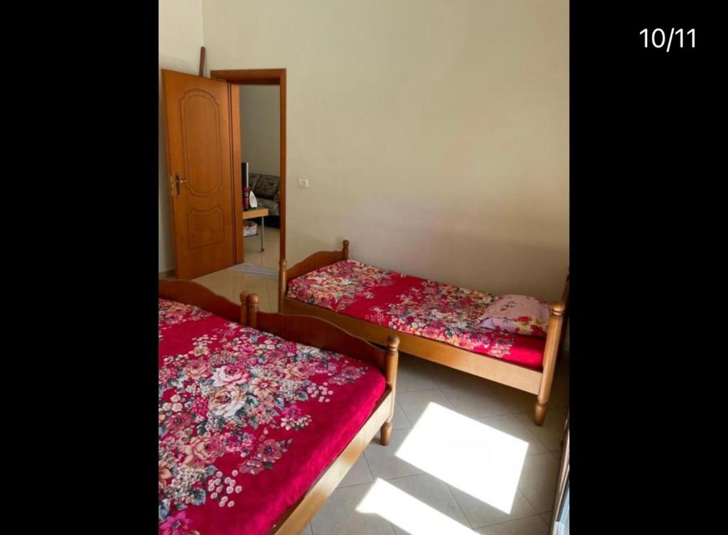 Postel nebo postele na pokoji v ubytování Villa Meka