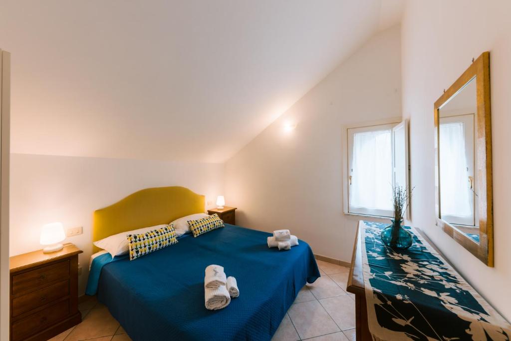 Postel nebo postele na pokoji v ubytování Tramonti Resort
