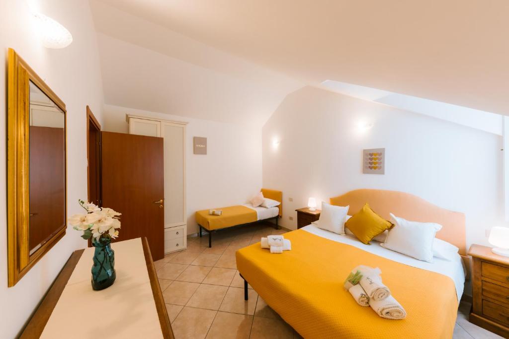 Postel nebo postele na pokoji v ubytování Tramonti Resort