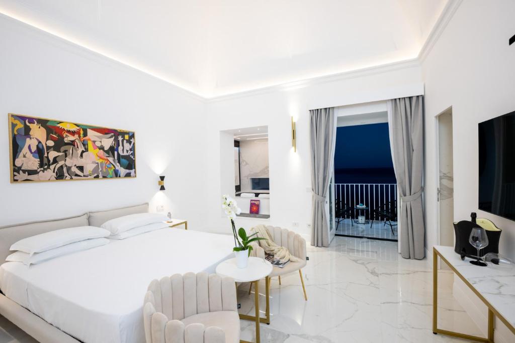 Postel nebo postele na pokoji v ubytování Gianlica Suites Positano