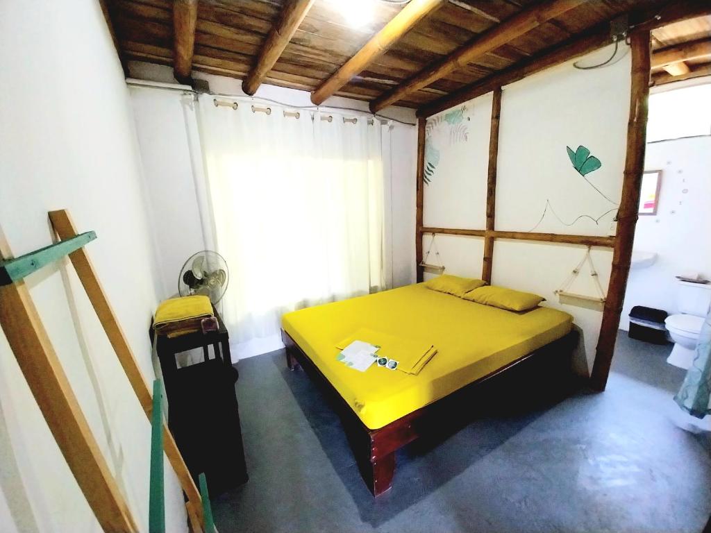 Postel nebo postele na pokoji v ubytování Flor de bambú