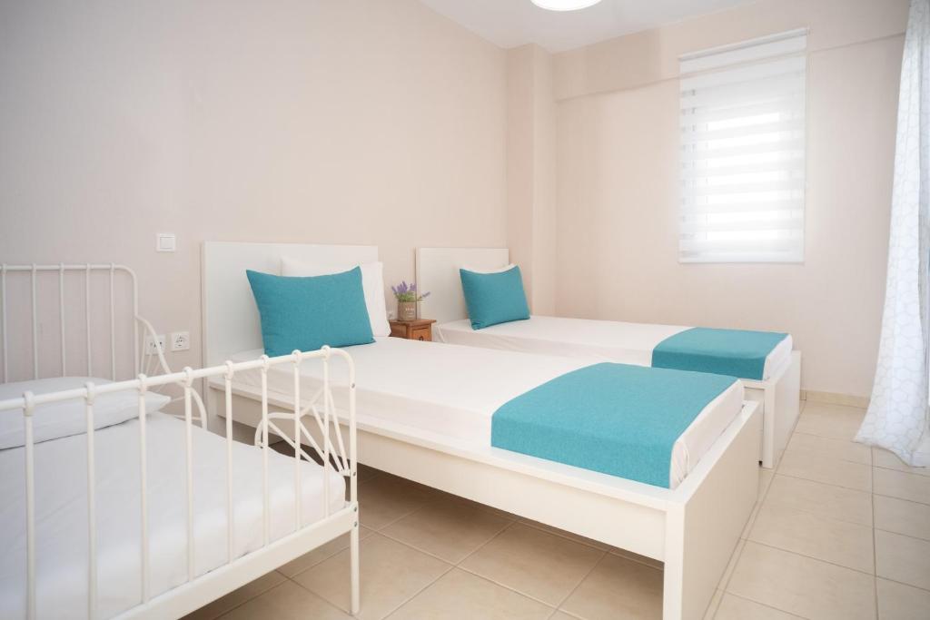 Postel nebo postele na pokoji v ubytování Cozy Home