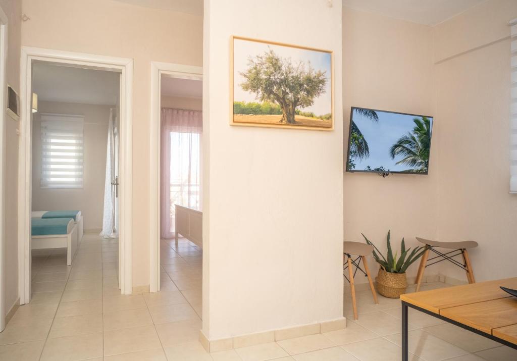TV a/nebo společenská místnost v ubytování Cozy Home