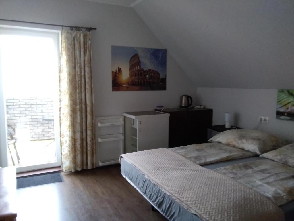 Postel nebo postele na pokoji v ubytování Pokoje Morska